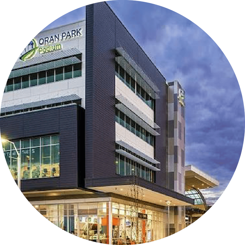 Modern commercial building at Orange Park Podium, Brisbane, featuring contemporary architecture and retail spaces.