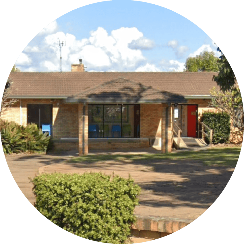 Chatterbox Speech therapy centre building in Australia, brick exterior with ramp access, sunny day, focused on children's speech and language development services.