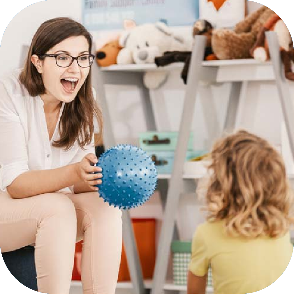 Child speech therapy session with a therapist using a sensory ball at Chatterbox Speech.