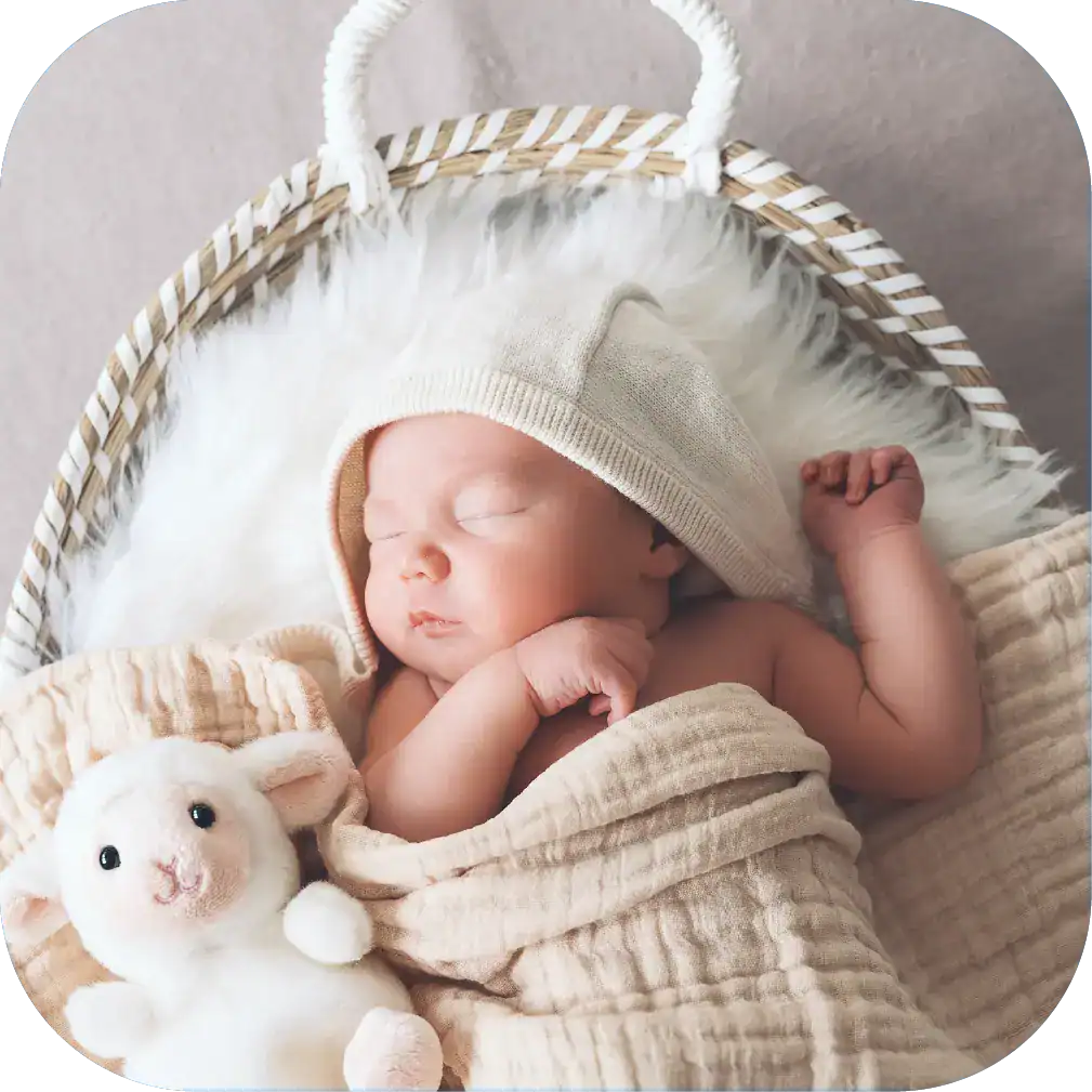 Adorable sleeping baby with soft blanket and plush toy, newborn baby in cozy wrap, peaceful sleep, nursery setting, infant comfort, baby sleep aid, natural baby photography, cutie pie, peaceful baby portrait, soothing baby image.