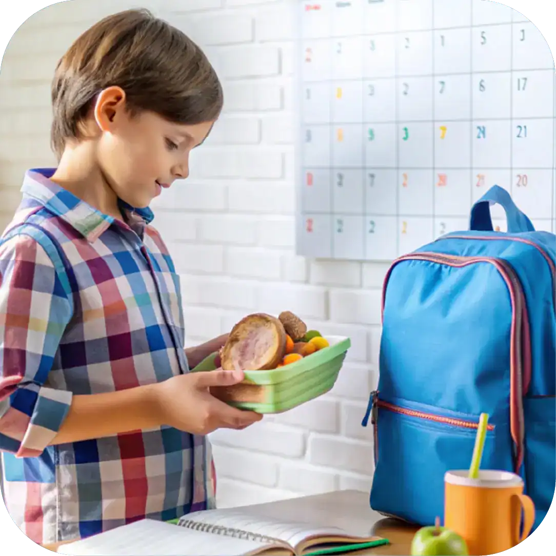Child holding lunchbox with food, preparing for school, with backpack and calendar in background, promoting speech and communication skills for children.